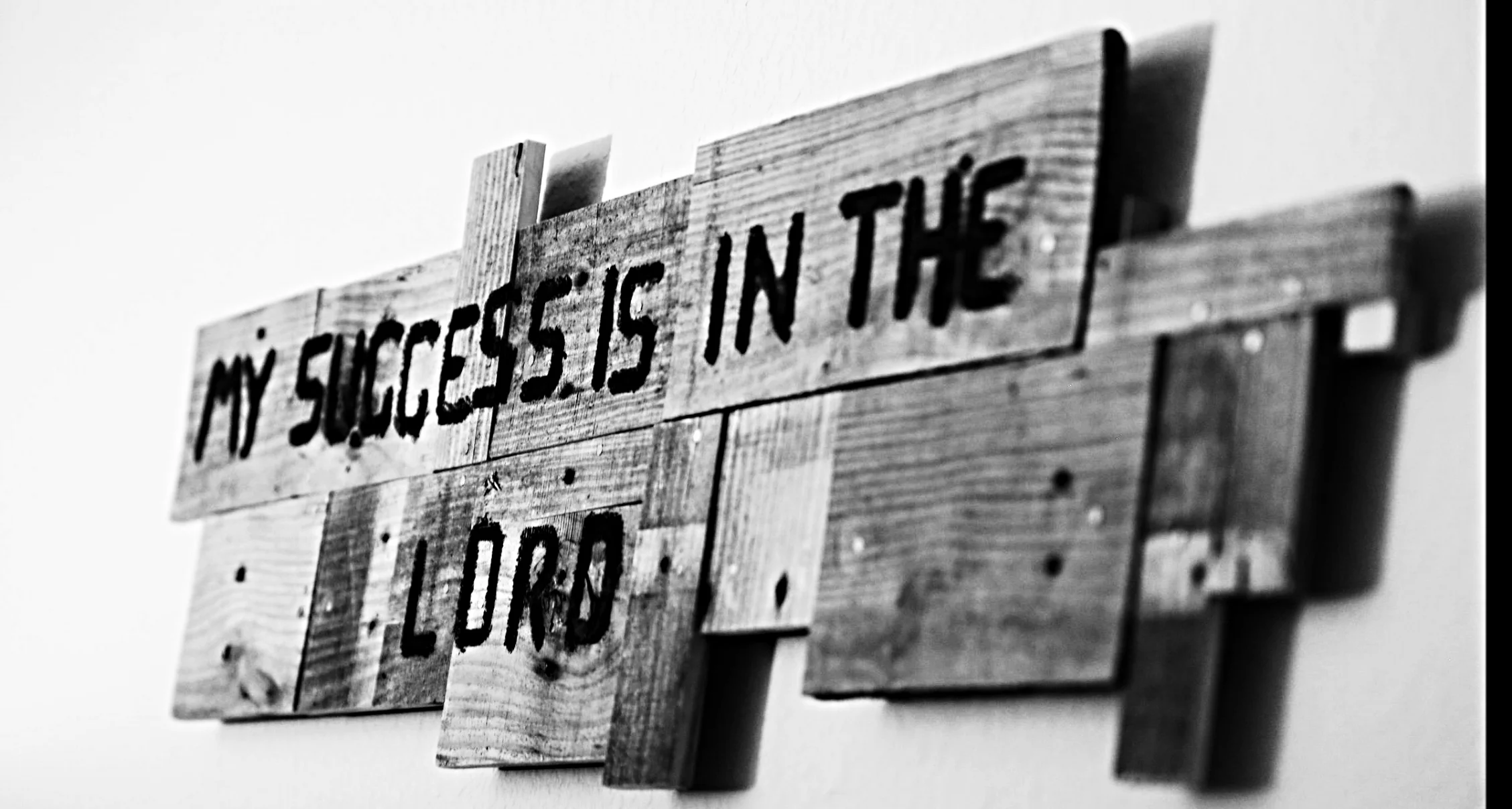 Hand-painted wooden sign at My Next Step reading: My success is in the Lord